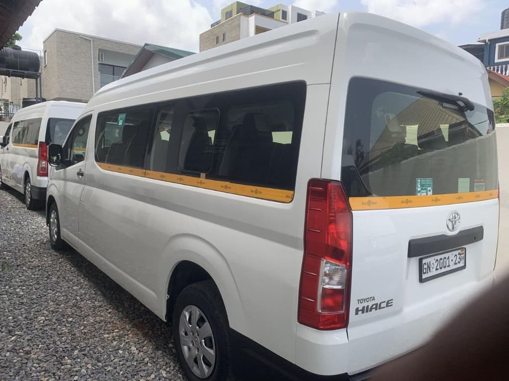 White Toyota Hiace passenger van for group and staff transportation in Ghana