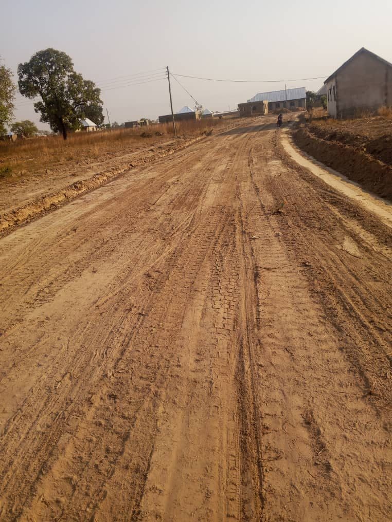 Road construction and drainage works on a community road in Ghana